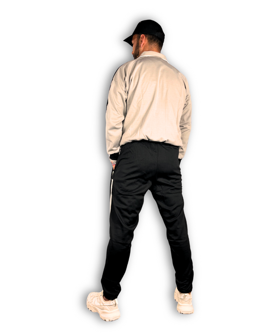 hintere ansicht anzug marke dragon sport graue jacke mit schwarzer hose