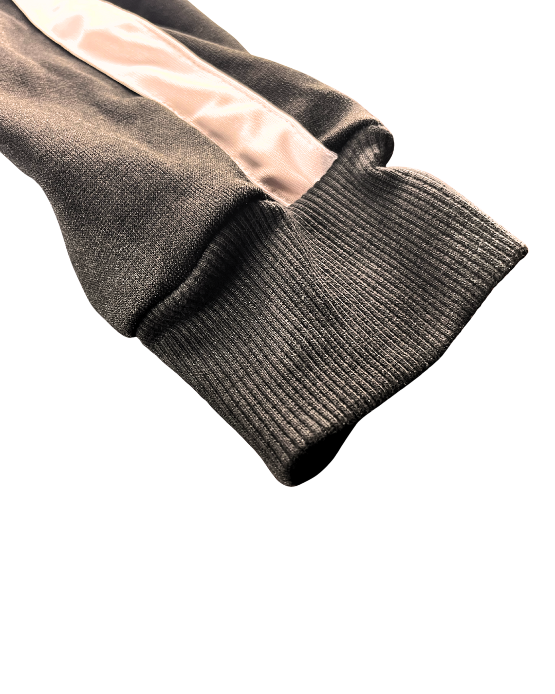 nahaufnahme bündchen ärmel jacke training sport jogginganzug günstig sportliche mode schwarz marke dragon sport